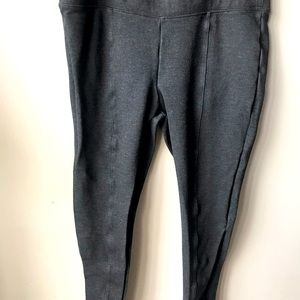 Woman’s dark gray-legging style dress pants